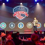 Director of Military Student Success Aaron Hall hosts Thanksgiving dinner in the Full Sail Live venue.
